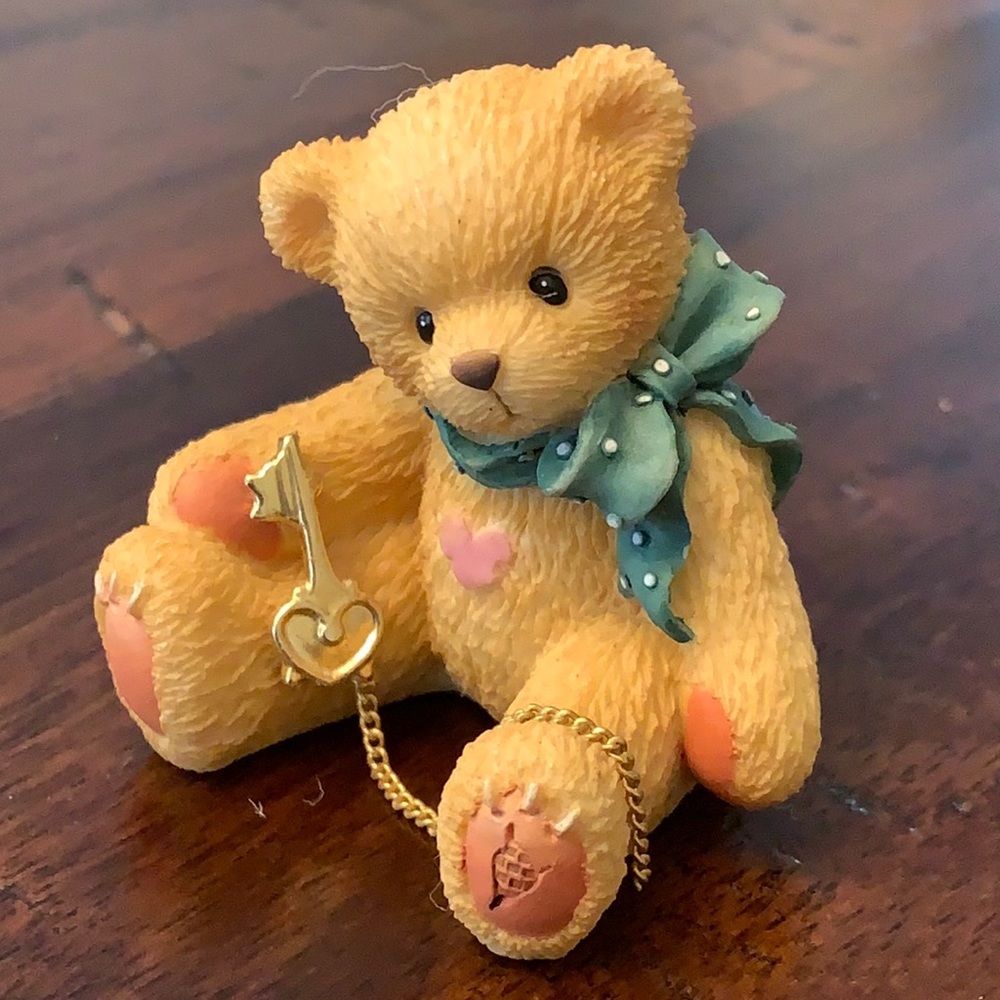 Cherished teddies bear with golden key figurine